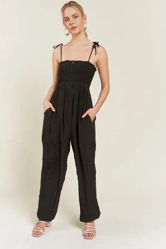 TEEK - PLUS SIZE SMOCKED TIE STRAP JUMPSUIT